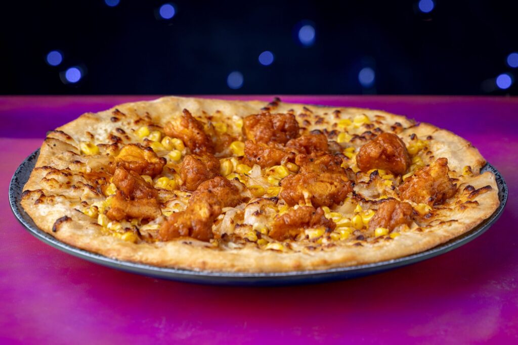 03 cosmos cafe & market hot honey chicken pizza