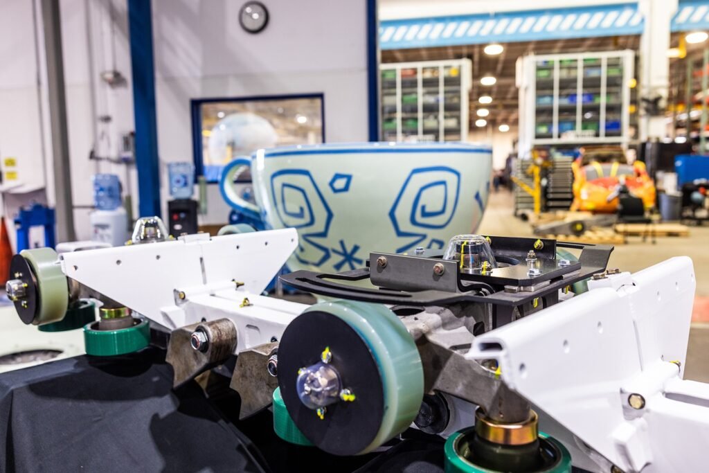 a mad tea party teacup waits for its parts to be inspected at central shops